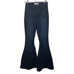 Kancan bell bottom flare jeans dark wash stretch denim high waisted. Size 25x32.
